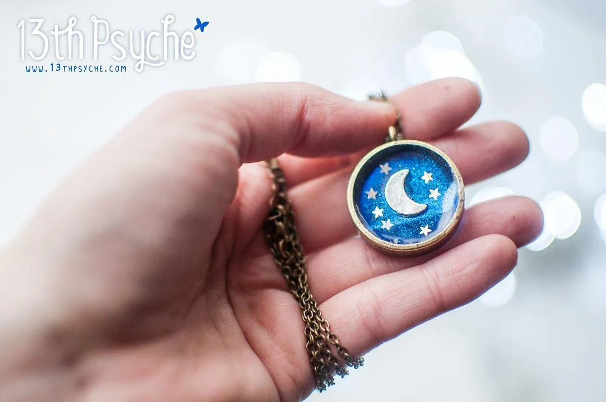 Crescent moon resin medalion pendant necklace