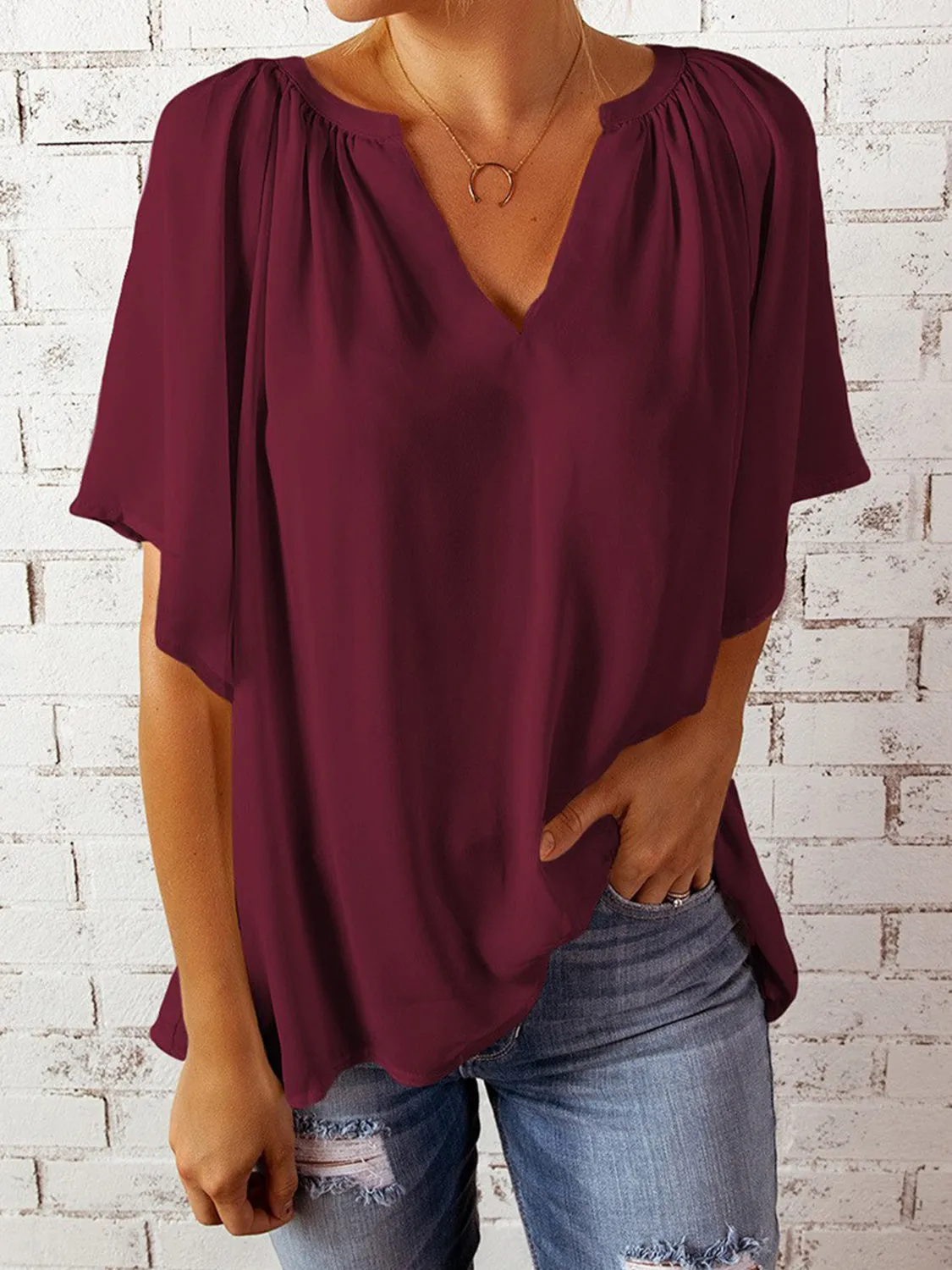 Explore More  Collection - Ruched Notched Half Sleeve Blouse