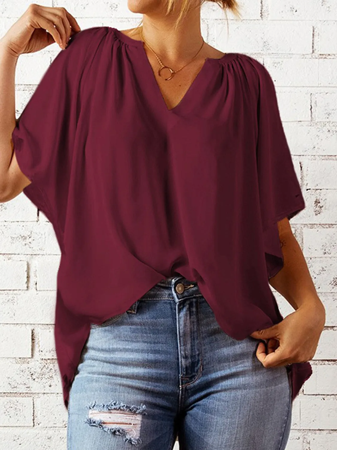 Explore More  Collection - Ruched Notched Half Sleeve Blouse